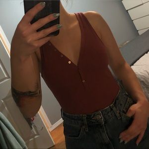 Dynamite XS mauve bodysuit